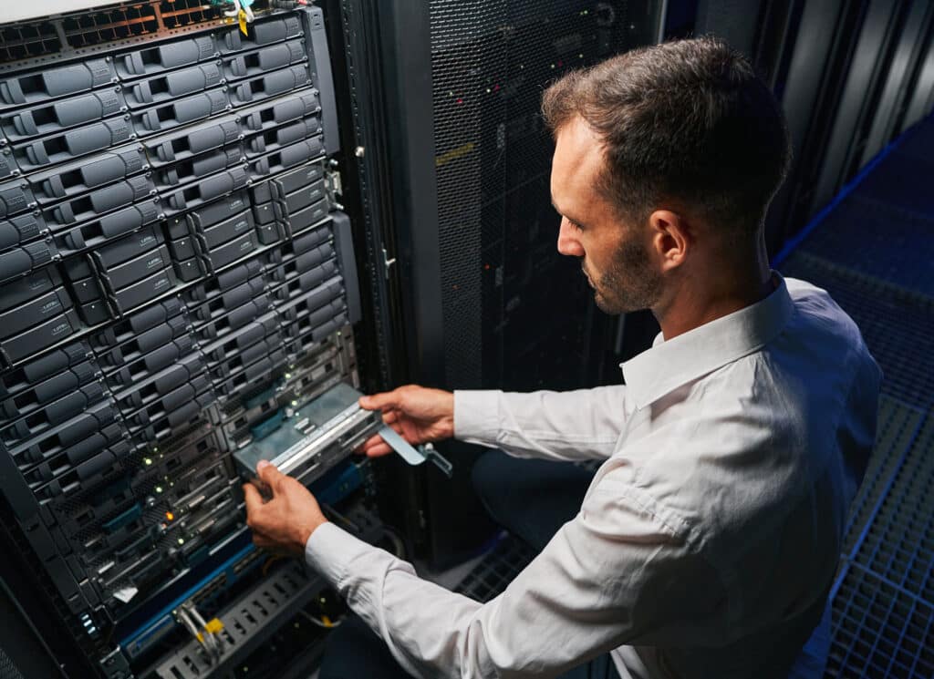 Professional it specialist working in data center